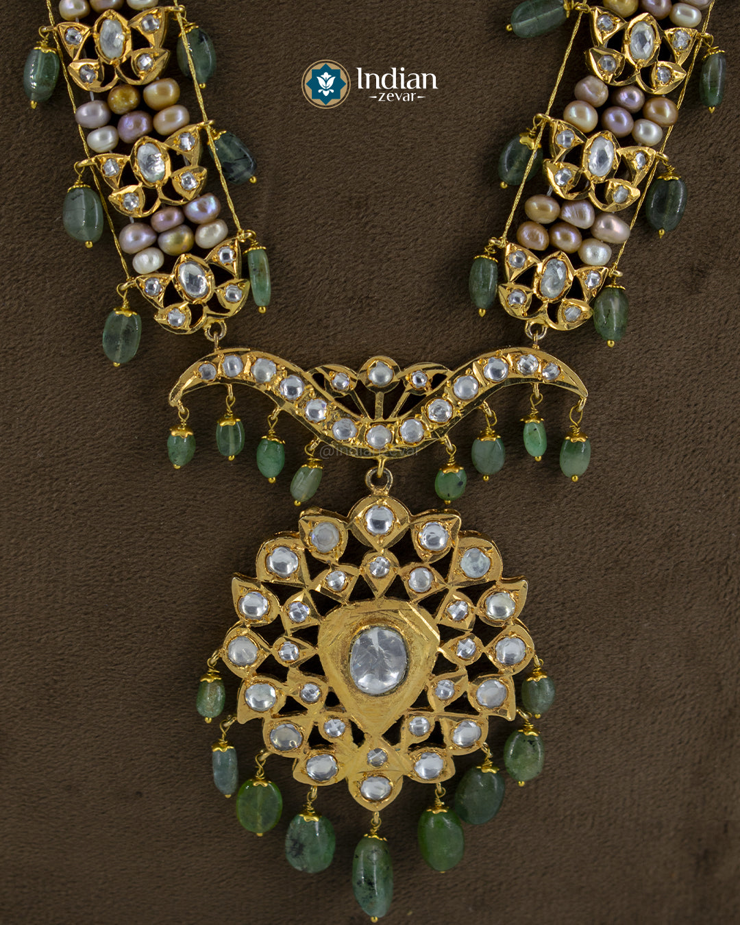 Indian Zevar bridal set – Hyderabadi Jadau Asif Jahi Haar (Murassa Haar) necklace with earrings. Crafted with pearls, Zambian emeralds, Pachi Polki, and gold-polished alloy. A timeless Rani Haar bridal necklace for weddings, Polki bridal sets price in India, Buy Kundan necklace online USA.