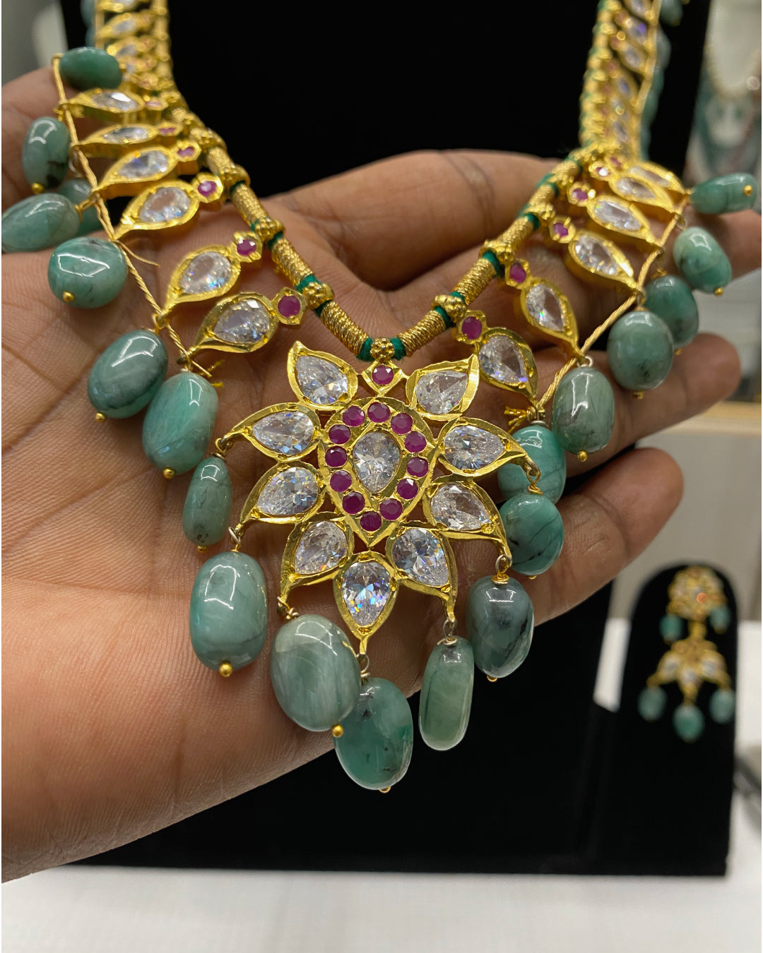 Buy Hyderabadi jewellery online – Pathani Long Haar Rani Haar bridal necklace with earrings, gold-polished alloy, real emeralds, AD stones, and Jadau work. Custom option available as Hyderabadi pearl necklace or Pearl bridal set Hyderabad. Ideal bridal sets, Polki bridal sets price in India, Buy Kundan necklace online USA
