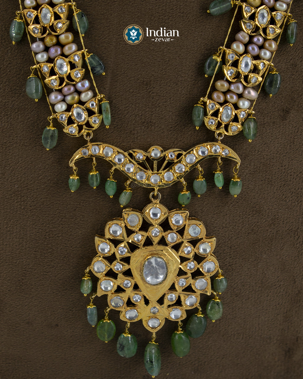 Indian Zevar bridal set – Hyderabadi Jadau Asif Jahi Haar (Murassa Haar) necklace with earrings. Crafted with pearls, Zambian emeralds, Pachi Polki, and gold-polished alloy. A timeless Rani Haar bridal necklace for weddings, Polki bridal sets price in India, Buy Kundan necklace online USA.