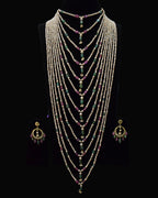 Indian Zevar The Grand Haar multi-string layered haar with freshwater pearls, ruby and emerald beads, CZ Polki and matching earrings.