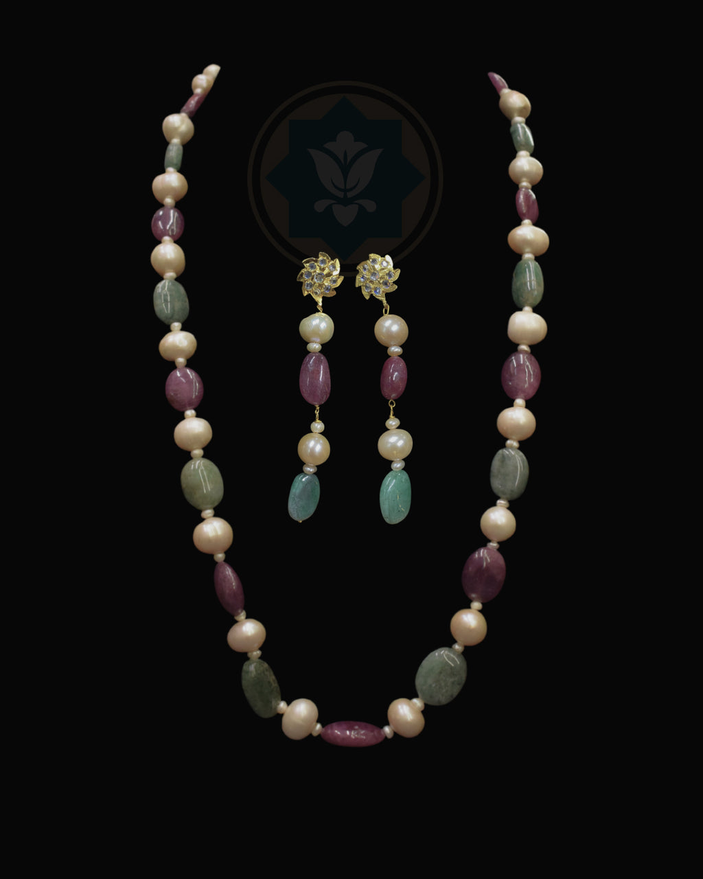 Indian Zevar Modern Muse necklace set with freshwater pearls, ruby and emerald beads, CZ Polki and matching earrings.