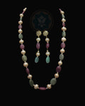 Indian Zevar Modern Muse necklace set with freshwater pearls, ruby and emerald beads, CZ Polki and matching earrings.