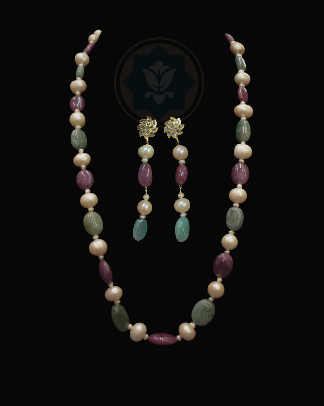 Indian Zevar Modern Muse necklace set with freshwater pearls, ruby and emerald beads, CZ Polki and matching earrings.