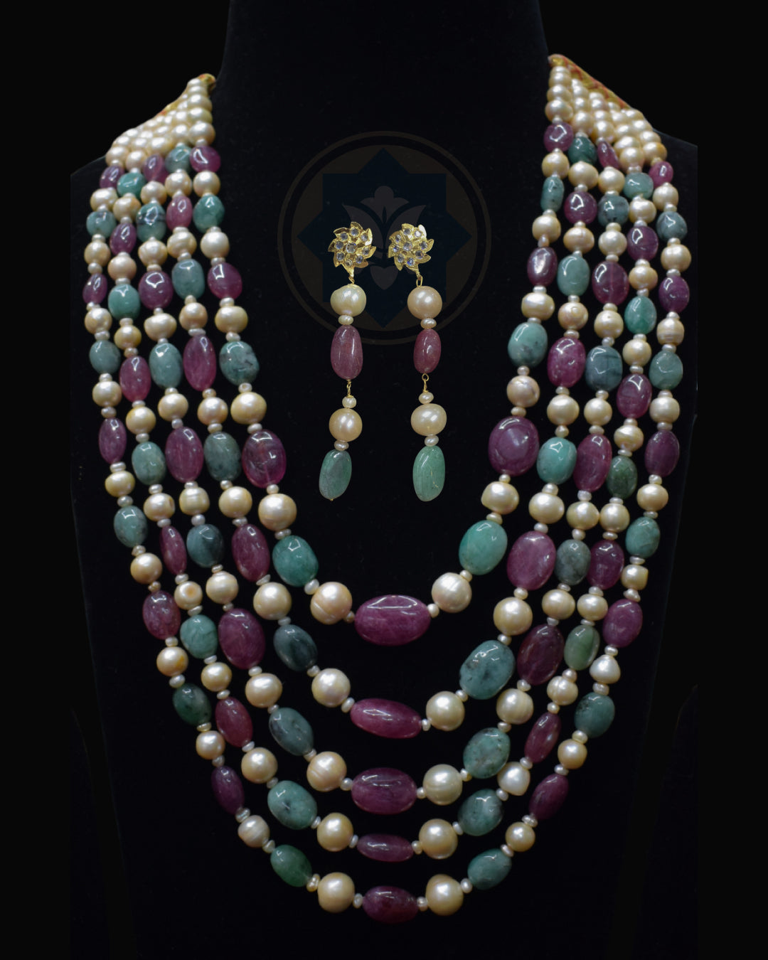 Indian Zevar five-string necklace set featuring big-size ruby beads, big-size emerald beads, freshwater pearls, CZ Polki and matching earrings.