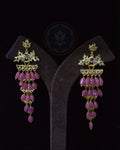 Pair of Indian Zevar Angoor Goshe chandelier earrings featuring real Bangkok Rubies, CZ Flat Cut Polki and premium gold polish on a copper base.