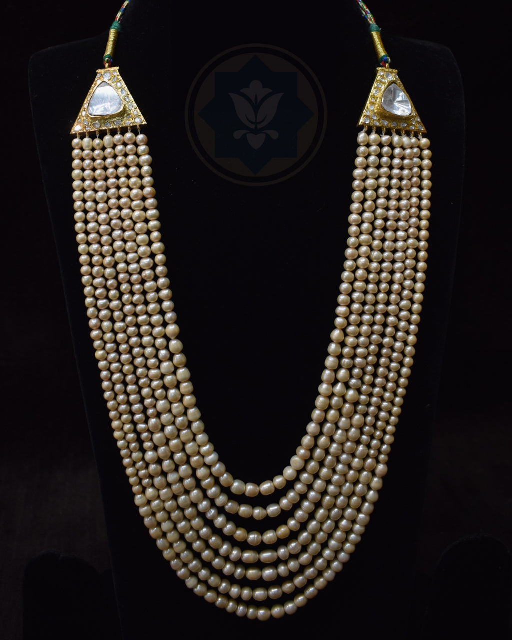 Indian Zevar seven-strand Sathlada featuring antique-look freshwater pearls, 925 silver terminals with premium gold polish and Moissanite Dank Work Polki panels.