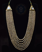 Indian Zevar seven-strand Sathlada featuring antique-look freshwater pearls, 925 silver terminals with premium gold polish and Moissanite Dank Work Polki panels.