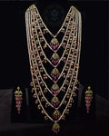 Indian Zevar Grand Ruby Sathlada with seven strings of real freshwater pearls, Bangkok Ruby GF beads, CZ Polki, Jadau hangings and matching Angoor Goshe chandelier earrings.