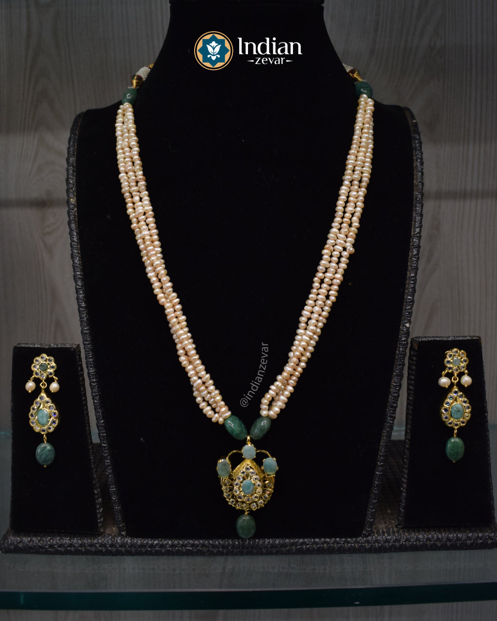 Elegant handcrafted Jugni necklace set with Hyderabadi gold plated Jadau design, CZ Polki and freshwater pearls.