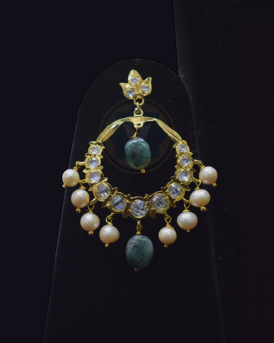 Indian Zevar Chandbali earrings with freshwater pearls, Sakota Brazilian Emeralds, Moissanite Polki and premium gold polish.
